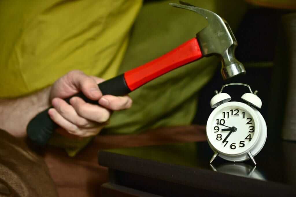 Hammer and alarm clock